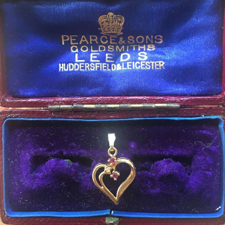 Vintage 9ct ruby and diamond heart shaped pendant