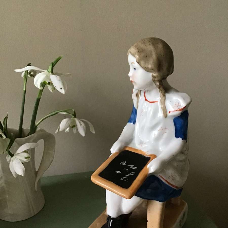 Early 1900s young girl bookends