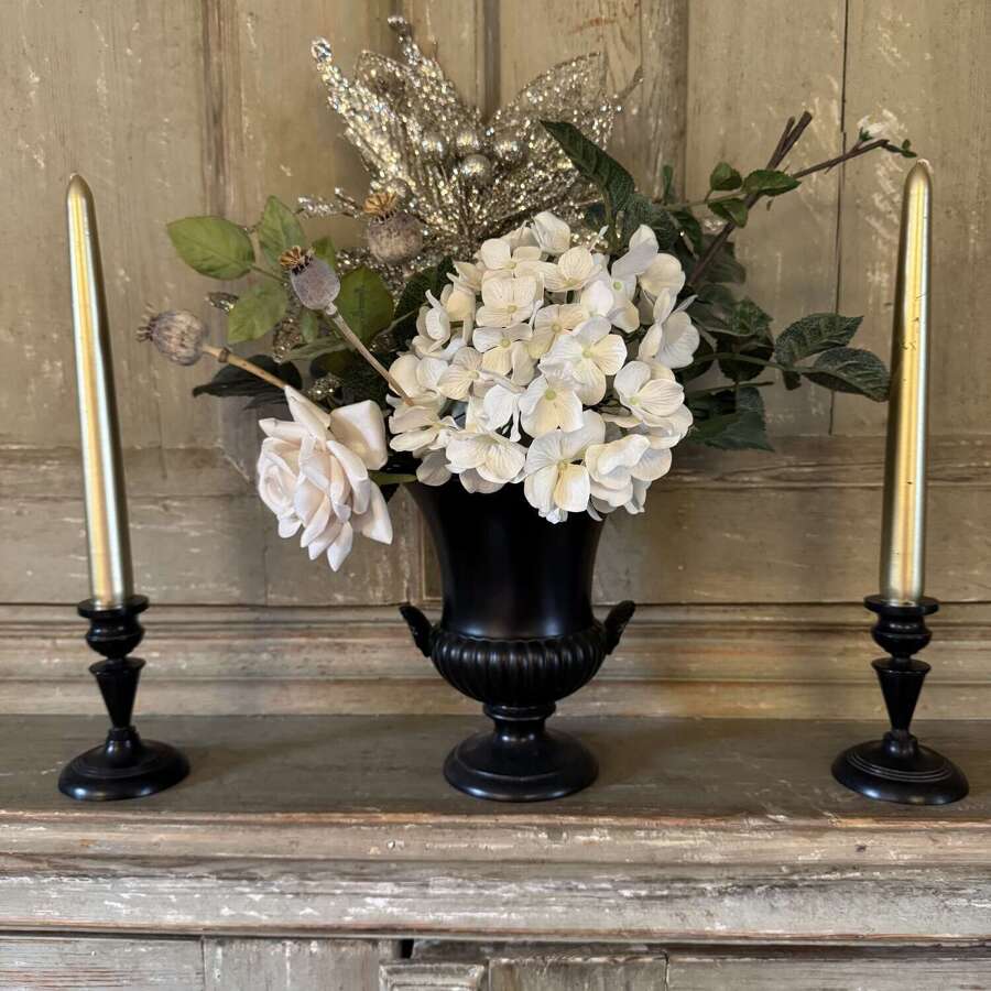 Pair of antique ebony candlesticks