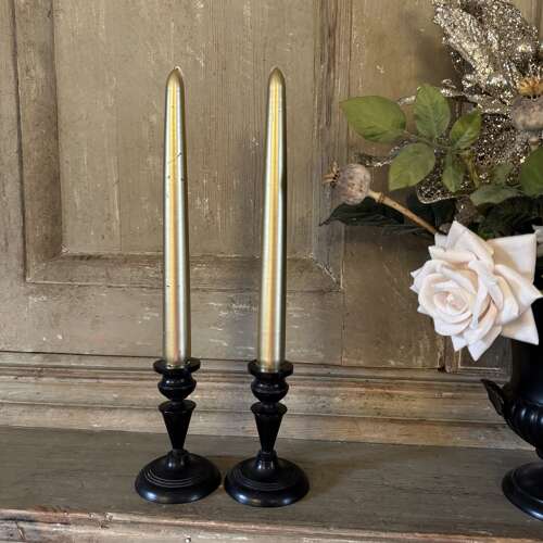 Pair of antique ebony candlesticks
