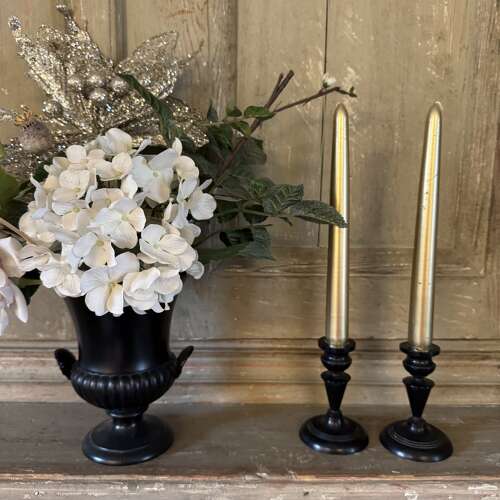 Pair of antique ebony candlesticks