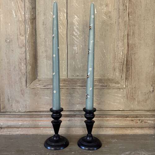 Pair of antique ebony candlesticks