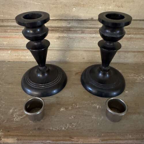 Pair of antique ebony candlesticks