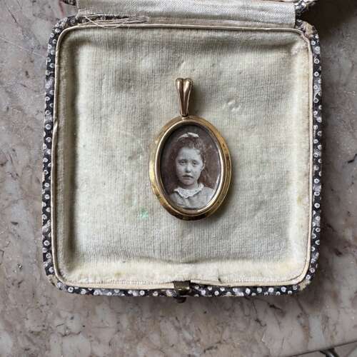 Victorian/early 20th C rolled gold oval double sided locket