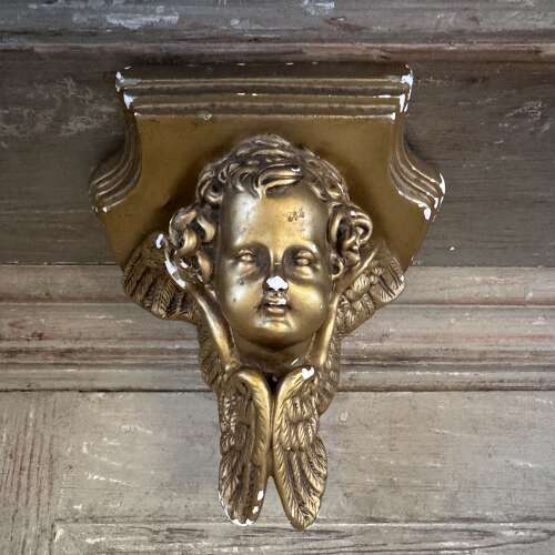 Vintage gilded chalkware cherub sconce