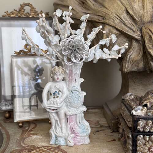 Victorian putti spill vase