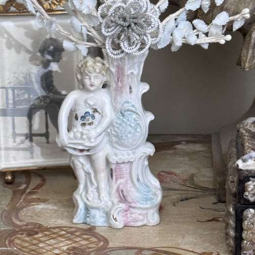 Victorian putti spill vase