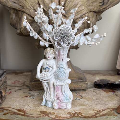 Victorian putti spill vase